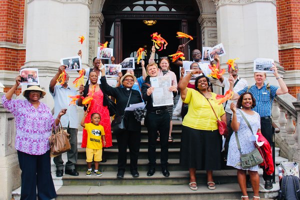 People from Croydon Citizens alliance celebrating after campaigning for affordable housing