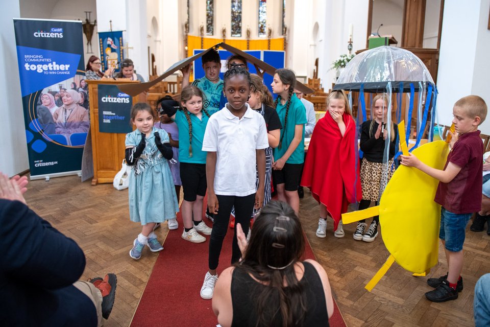 Students dressed up in costumes representing homes that are too cold, too hot, damp and mouldy at a Cardiff Citizens Assembly