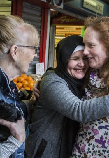 Sponsor Refugees hug