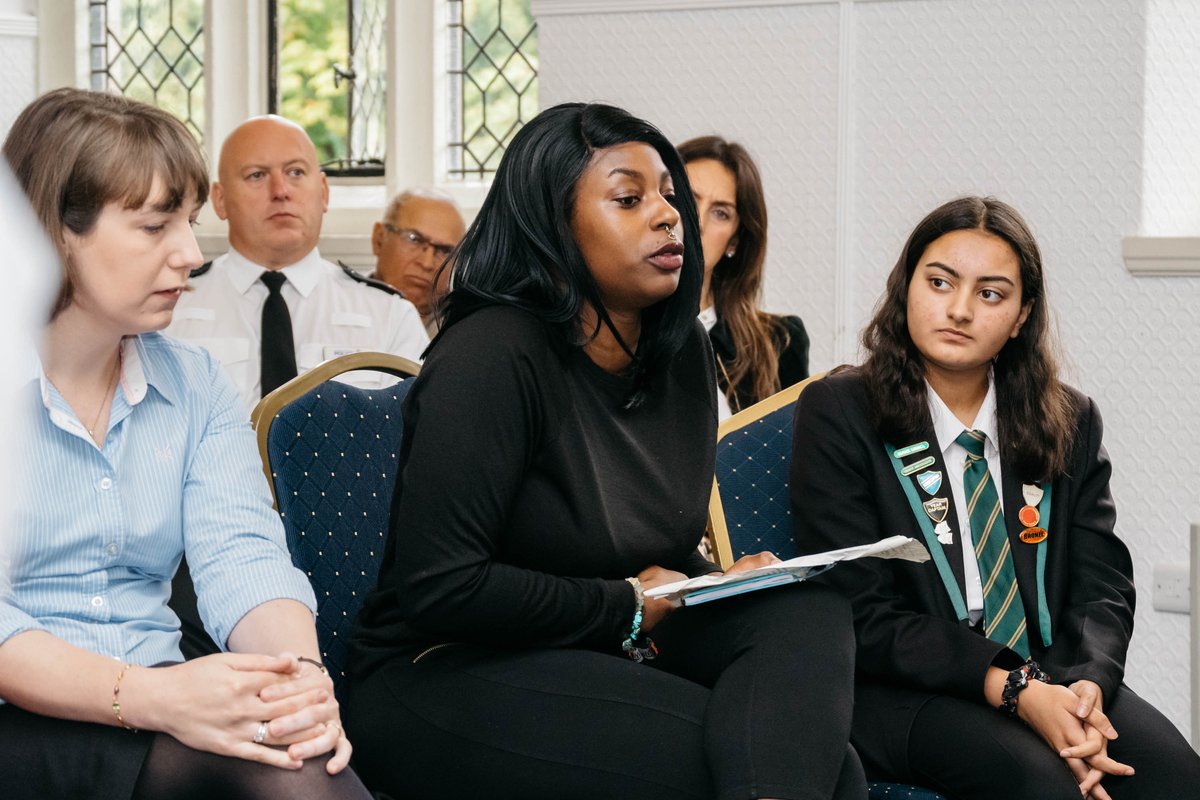 Women speaking during community discussion