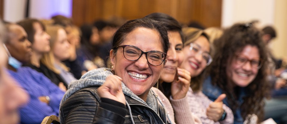 Headshot of person smiling during Citizens UK Living Wage for Social Care Assembly