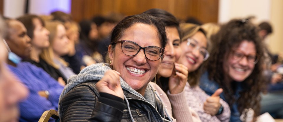 Headshot of person smiling during Citizens UK Living Wage for Social Care Assembly