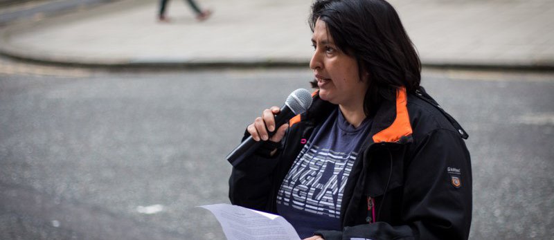 Woman speaking in outdoor public action