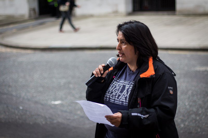 Woman speaking in outdoor public action