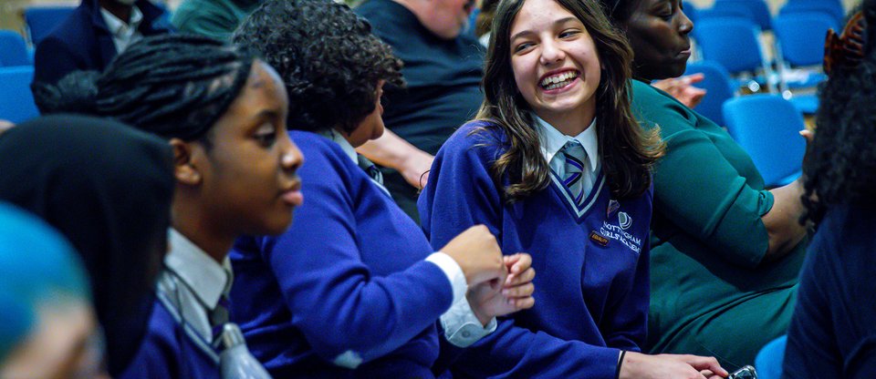 Nottingham Girls Academy smiling in an evaluation after assembly