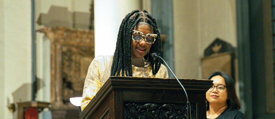 close up picture of a leader standing at a podium in a church