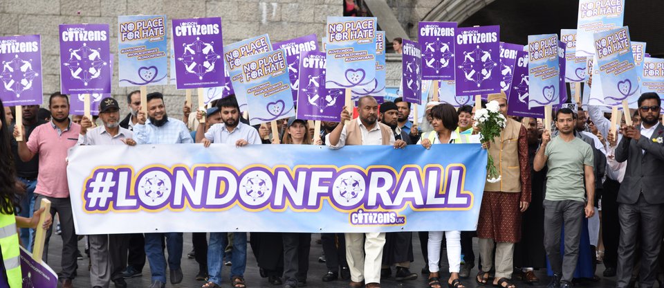 Public protest with banners at London Bridge for Refugees Welcome