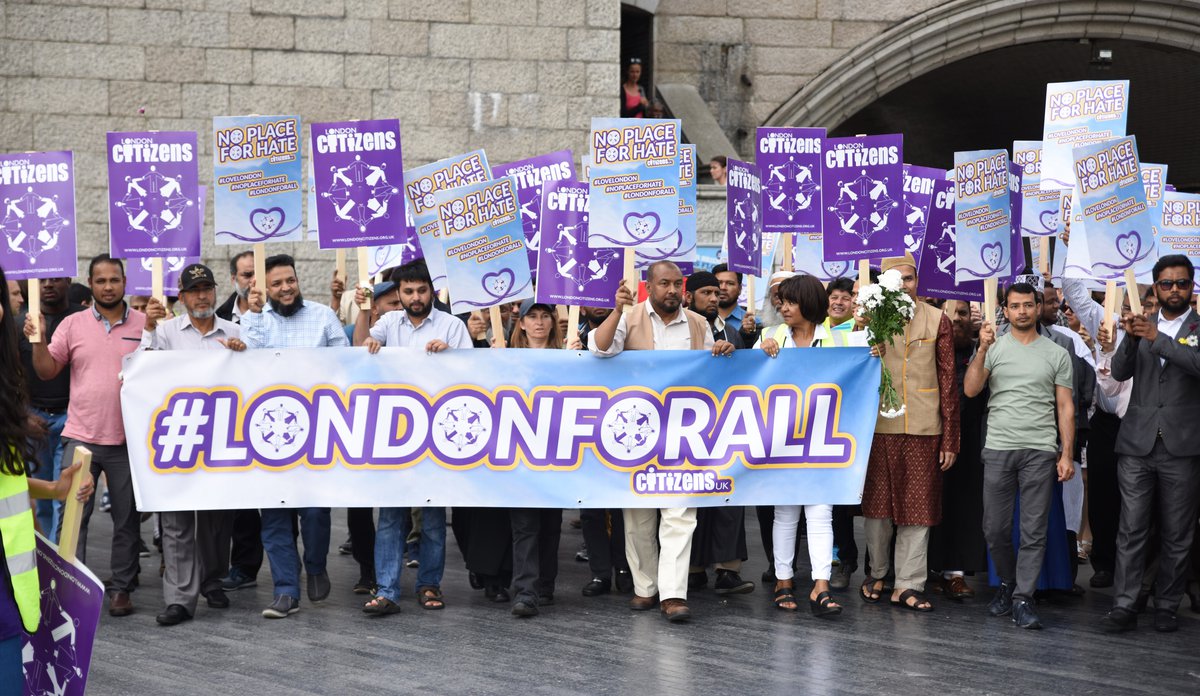 Public protest with banners at London Bridge for Refugees Welcome