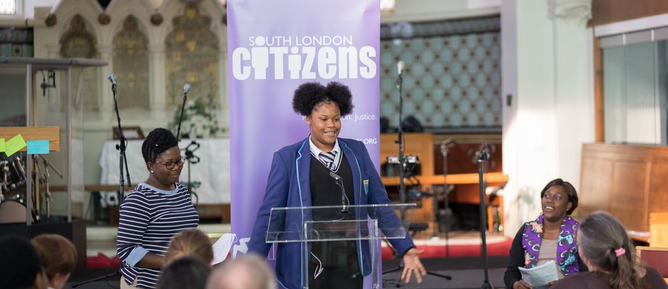 Student leader speaking at a podium