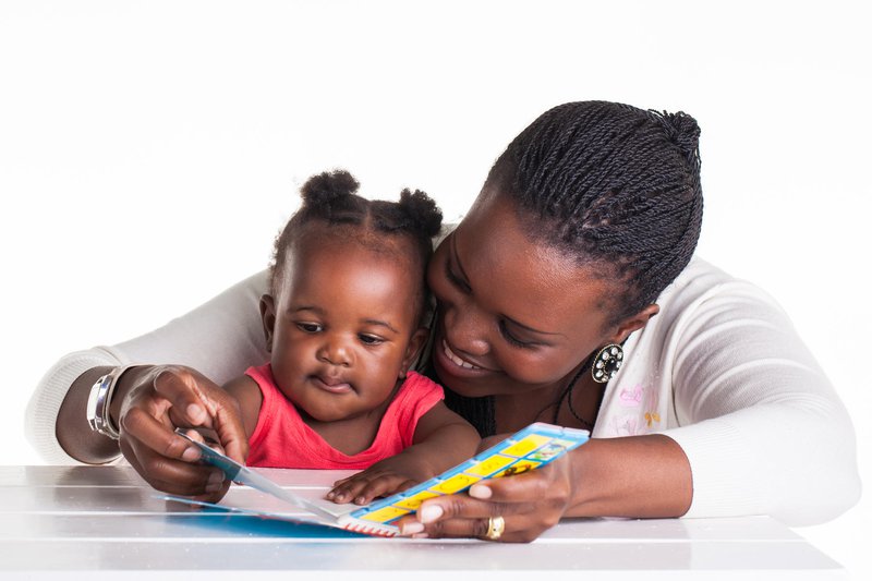 parent and baby reading